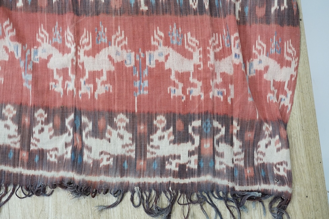 A Sumbanese shoulder cloth, an Indian chain stitch panel and a finely woven silk stole